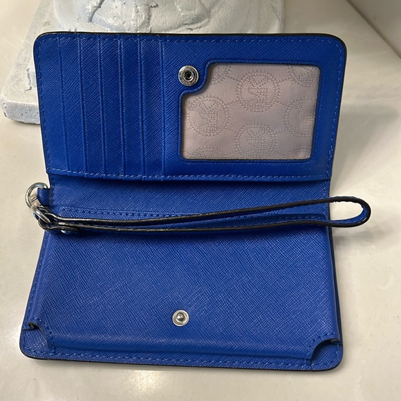 ⭐️⭐️ Women’s pebble leather Michael Kors wallet. Brand new condition. - Picture 7 of 12